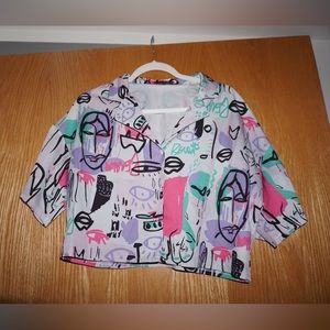 Abstract short sleeve button down top